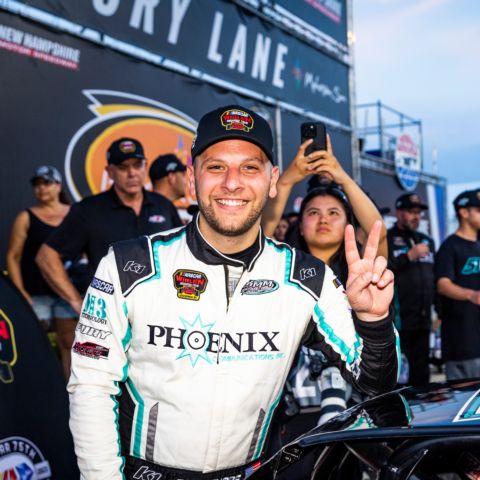 Three-time NASCAR Whelen Modified Tour champion Justin Bonsignore celebrates in victory lane on July 15, 2023 after capturing his second New Hampshire Motor Speedway win in the Mohegan Sun 100.