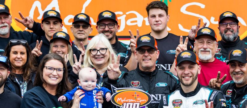 Justin Bonsignore (right) celebrates his second consecutive Mohegan Sun 100 win at New Hampshire Motor Speedway Saturday with his wife Emily (left) and son Evan (center).