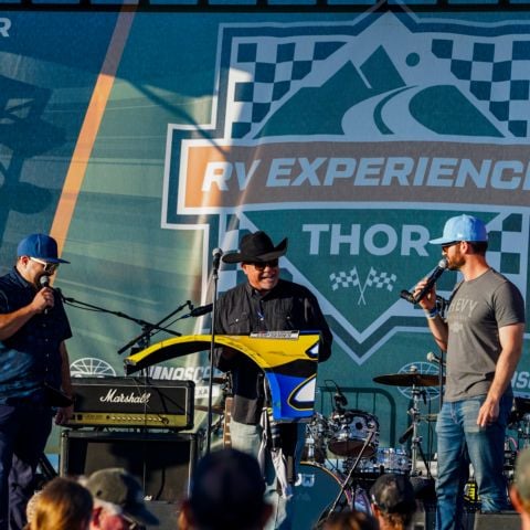 NASCAR Cup Series driver Corey LaJoie (far right) helped auction off an autographed quarter panel from one of his race cars during the Live Auction to benefit Speedway Children’s Charities during last year’s NASCAR at COTA weekend in Austin, Texas.